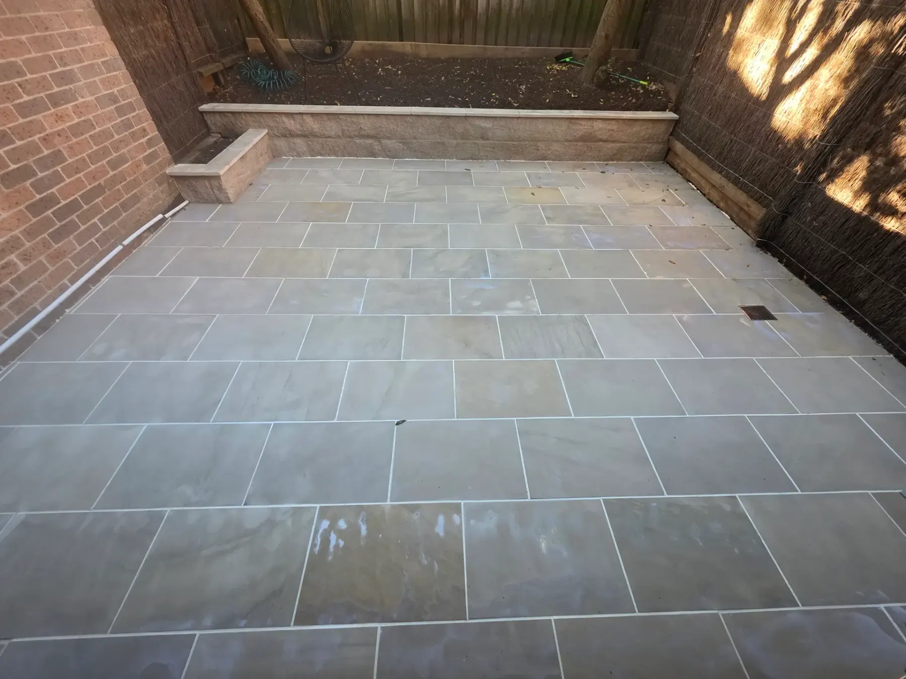 Finished sandstone courtyard paving in a Cremorne project